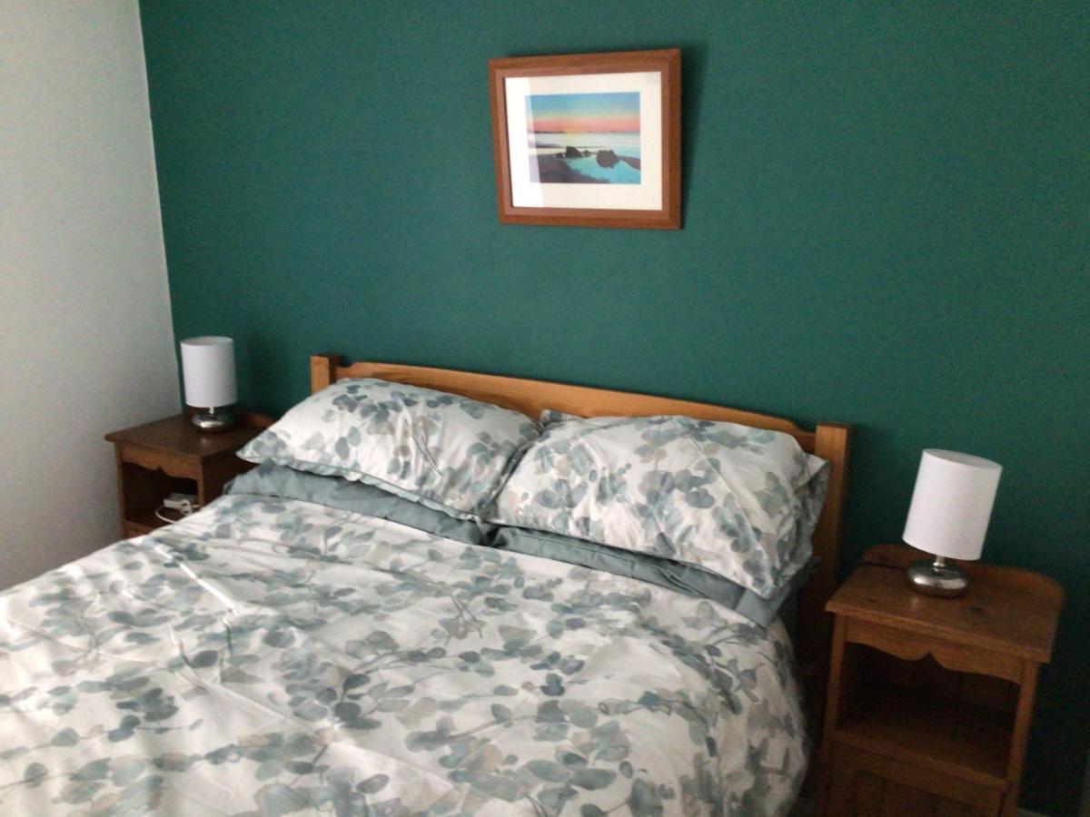 Victoria Cottage: Bedroom with wardrobe hanging space and small chest of drawers.