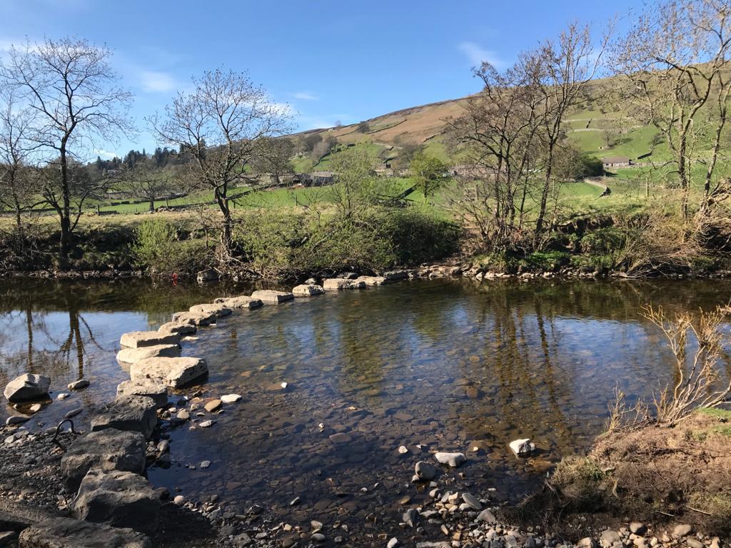 Stepping stones across the river Swale near Reeth, North Yorkshire